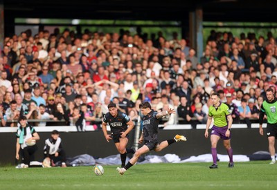 090526 - Ospreys v Scarlets - United Rugby Championship - Dan Edwards of Ospreys kicks a penalty