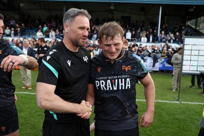090526 - Ospreys v Scarlets - United Rugby Championship - Ospreys Head Coach Mark Jones and Jac Morgan at full time