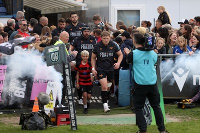 090526 - Ospreys v Scarlets - United Rugby Championship - Jac Morgan of Ospreys runs out with mascot