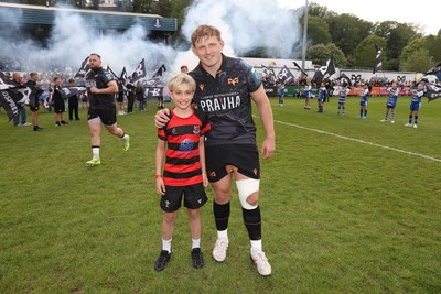 090526 - Ospreys v Scarlets - United Rugby Championship - Jac Morgan of Ospreys with mascot