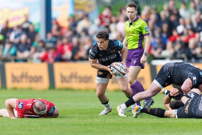 090526 - Ospreys v Scarlets - United Rugby Championship - Kieran Hardy of Ospreys makes a break