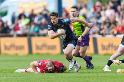 090526 - Ospreys v Scarlets - United Rugby Championship - Kieran Hardy of Ospreys makes a break