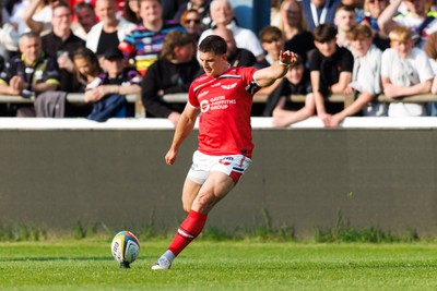 090526 - Ospreys v Scarlets - United Rugby Championship - Joe Hawkins of Scarlets kicks at goal