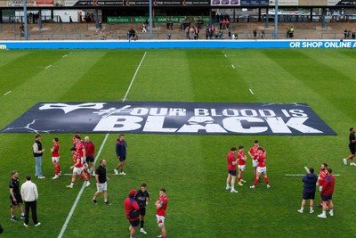 090526 - Ospreys v Scarlets - United Rugby Championship - Ospreys 'Our Blood is Black' banner at the end of the match