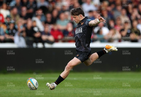 090526 - Ospreys v Scarlets - United Rugby Championship - Dan Edwards of Ospreys kicks the conversion