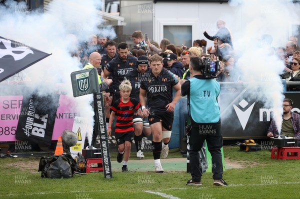 090526 - Ospreys v Scarlets - United Rugby Championship - Jac Morgan of Ospreys runs out with mascot