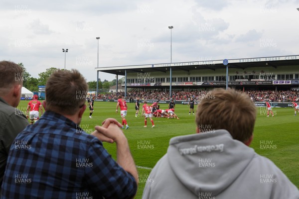 090526 - Ospreys v Scarlets - United Rugby Championship - General view of fans watching the action at the Brewery Field