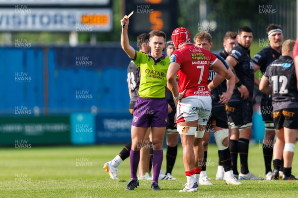 090526 - Ospreys v Scarlets - United Rugby Championship - Referee Ben Connor shows a yellow card as Joe Roberts of Scarlets is sent to the sin bin