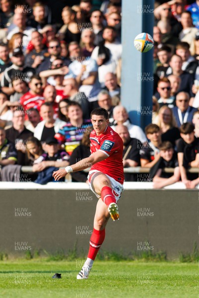 090526 - Ospreys v Scarlets - United Rugby Championship - Joe Hawkins of Scarlets kicks at goal