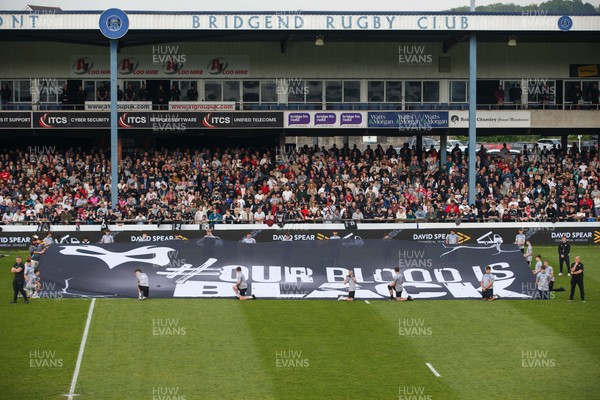 090526 - Ospreys v Scarlets - United Rugby Championship - Ospreys 'Our Blood is Black' banner before the match