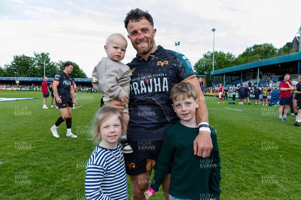 090526 - Ospreys v Scarlets - United Rugby Championship - Luke Morgan of Ospreys and his children at the end of the match