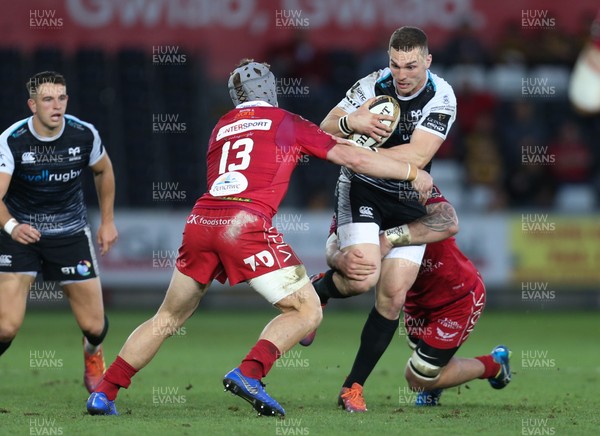 180519 - Ospreys v Scarlets, Guinness PRO14 European Play Off - George North of Ospreys is tackled by Blade Thomson of Scarlets and Jonathan Davies of Scarlets
