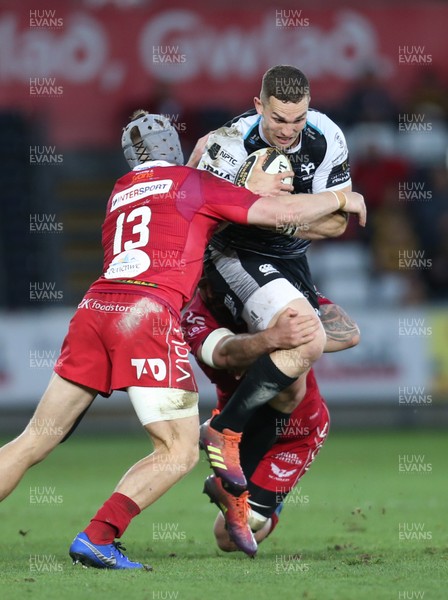 180519 - Ospreys v Scarlets, Guinness PRO14 European Play Off - George North of Ospreys is tackled by Blade Thomson of Scarlets and Jonathan Davies of Scarlets