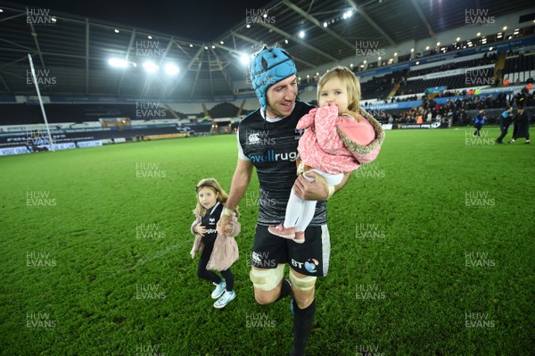 221218 - Ospreys v Scarlets - Guinness PRO14 - Justin Tipuric of Ospreys with his children at the end of the game