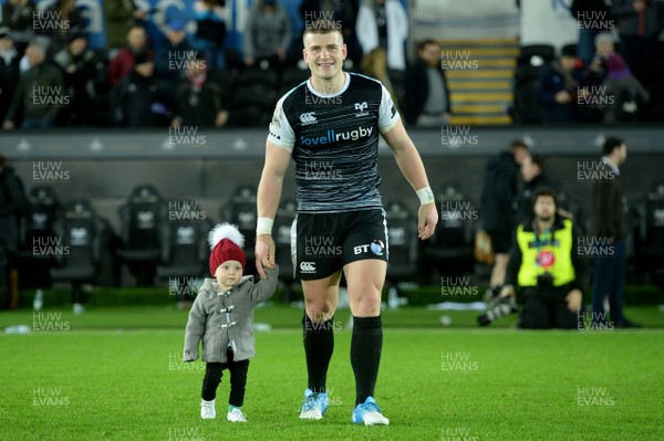 221218 - Ospreys v Scarlets - Guinness PRO14 - Scott Williams of Ospreys with son Seb at the end of the game