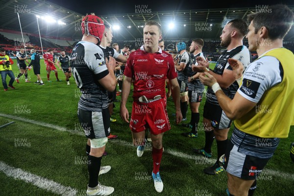 221218 - Ospreys v Scarlets - Guinness PRO14 - A dejected Hadleigh Parkes of Scarlets at full time