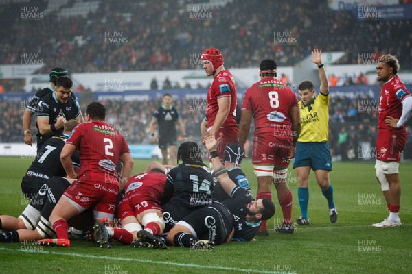 261123 - Ospreys v Scarlets - United Rugby Championship - Referee Mike English awards a try as Keiran Williams of Ospreys goes over