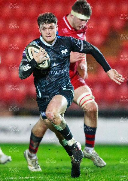 261220 - Ospreys v Scarlets - Guinness PRO14 - Reuben Morgan-Williams of Ospreys makes a break that leads to his try