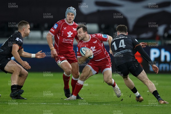 261222 - Ospreys v Scarlets - United Rugby Championship - Ryan Conbeer of Scarlets looks for a way through the defence