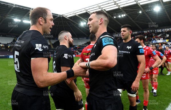 300422 - Ospreys v Scarlets - United Rugby Championship - Alun Wyn Jones and George North of Ospreys at the end of the game