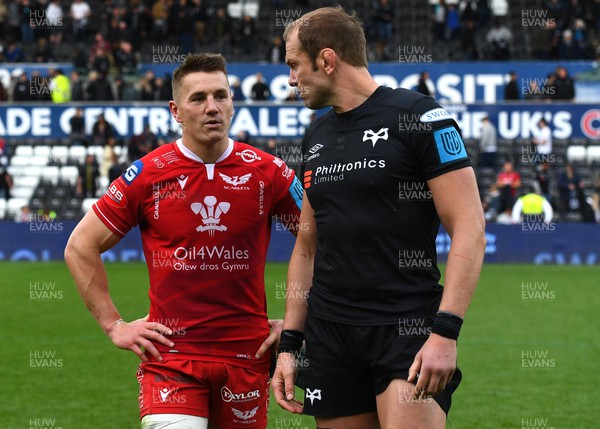 300422 - Ospreys v Scarlets - United Rugby Championship - Jonathan Davies of Scarlets and Alun Wyn Jones of Ospreys at the end of the game