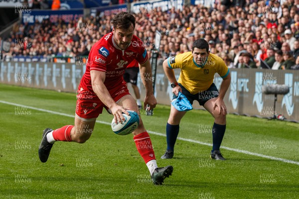 300422 - Ospreys v Scarlets - United Rugby Championship - Ryan Conbeer of Scarlets scores his second try of the match