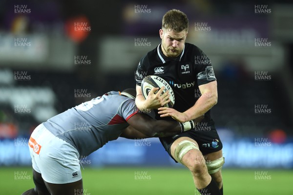160218 - Ospreys v Southern Kings - Guinness PRO14 - Olly Cracknell of Ospreys takes on Luvuyo Pupuma of Southern Kings