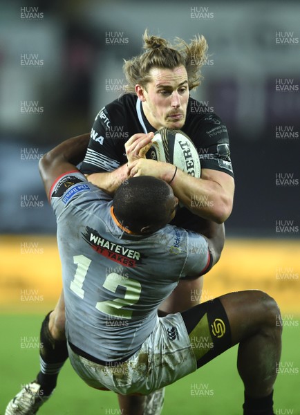 160218 - Ospreys v Southern Kings - Guinness PRO14 - Jeff Hassler of Ospreys is tackled by Luzuko Vulindlu of Southern Kings