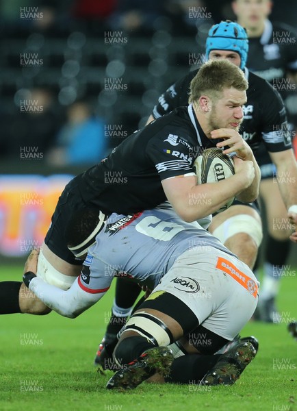 160218 - Ospreys v Southern Kings, Guinness PRO14 - Olly Cracknell of Ospreys is tackled by Andisa Ntsila of Southern Kings