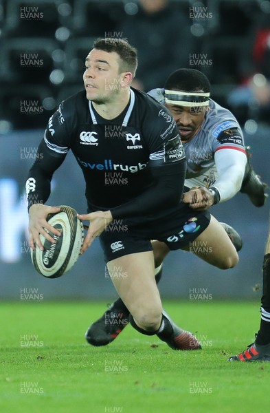 160218 - Ospreys v Southern Kings, Guinness PRO14 - Tom Habberfield of Ospreys is tackled by Andisa Ntsila of Southern Kings
