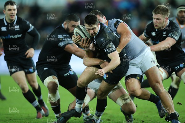 160218 - Ospreys v Southern Kings, Guinness PRO14 - Owen Watkin of Ospreys is tackled by Michael Willemse of Southern Kings