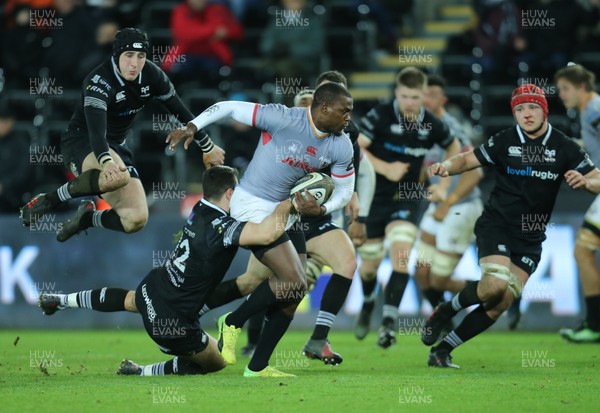 160218 - Ospreys v Southern Kings, Guinness PRO14 - Michael Makasa of Southern Kings crashes through the tackle from Owen Watkin of Ospreys