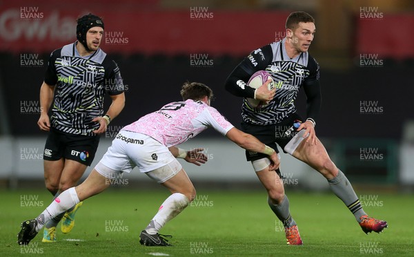 081218 - Ospreys v Stade Francais - European Challenge Cup - George North of Ospreys is tackled by Clement Daguin of Stade Francais