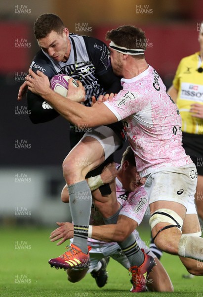 081218 - Ospreys v Stade Francais - European Challenge Cup - George North of Ospreys is tackled by Clement Daguin and Alexandre Flanquart of Stade Francais