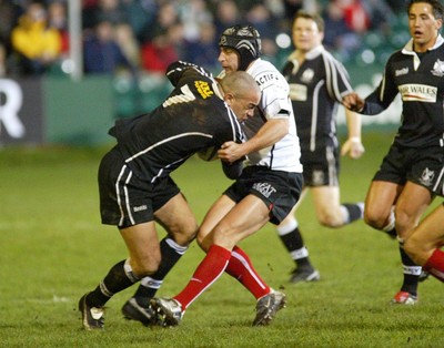 160104Neath Swansea Ospreys v Toulouse  Ospreys Gavin Thomas is tackled by Yann Delaige  