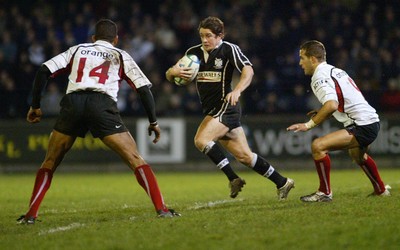 160104Neath Swansea Ospreys v Toulouse  Ospreys Shane Williams looks to get past Emile Ntamack  