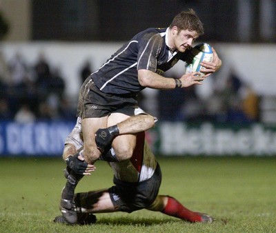 160104Neath Swansea Ospreys v Toulouse  Ospreys Andrew Williams is tackled by Trevor Brennan  