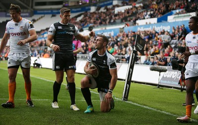 080918 - Ospreys v Toyota Cheetahs - Guinness PRO14 - George North celebrates scoring a try with James Hook of Ospreys