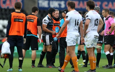 080918 - Ospreys v Toyota Cheetahs - Guinness PRO14 - Dan Evans of Ospreys leaves the field injured