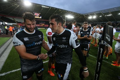 080918 - Ospreys v Toyota Cheetahs - Guinness PRO14 - Tom Botha and Sam Davies of Ospreys at full time