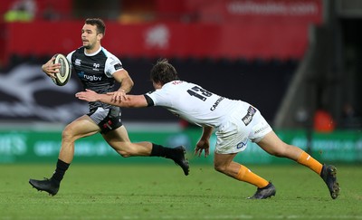 080918 - Ospreys v Toyota Cheetahs - Guinness PRO14 - Tom Habberfield of Ospreys is tackled by Bernhard Janse Van Rensburg of Cheetahs