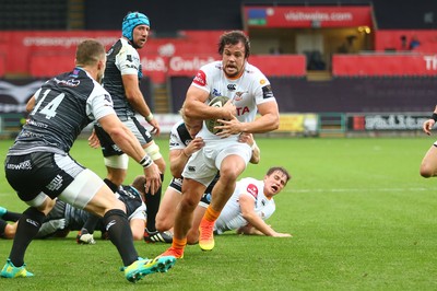 080918 - Ospreys v Edinburgh - GuinnessPro14 - Nico Lee of Cheetahs is tackled by Aled Davies of Ospreys