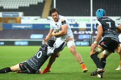 080918 - Ospreys v Edinburgh - GuinnessPro14 - Nico Lee of Cheetahs is tackled by Sam Davies of Ospreys