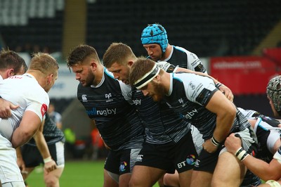 080918 - Ospreys v Edinburgh - GuinnessPro14 - Tom Botha(L) Scott Otten and Rhodri Jones of Ospreys prepare to scrummage