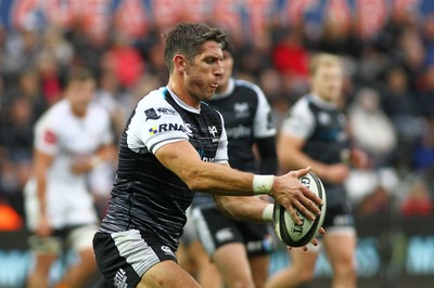 080918 - Ospreys v Edinburgh - GuinnessPro14 - James Hook of Ospreys clears the ball