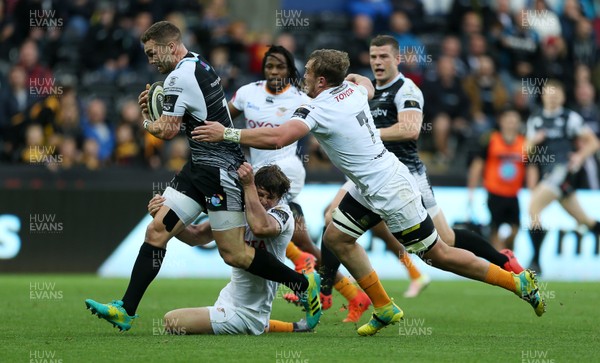 080918 - Ospreys v Toyota Cheetahs - Guinness PRO14 - George North of Ospreys is tackled by Bernhard Janse Van Rensburg and Aidon Davis of Cheetahs