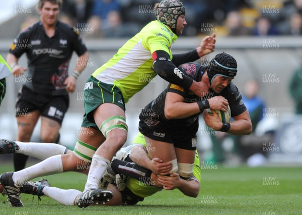 06.12.08 - Ospreys v Benetton Treviso - Heineken Cup - Ospreys Jonathan Thomas is stopped by the Treviso defence. 