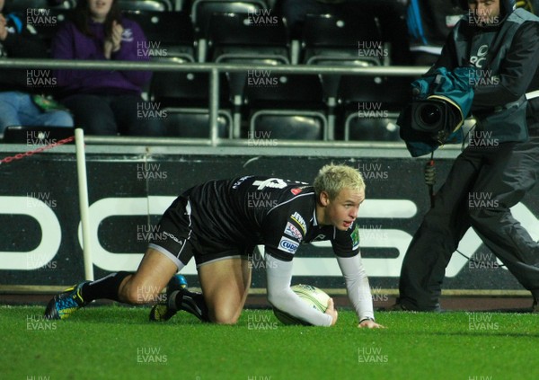 121012 Ospreys v Treviso - Heineken Cup -Ospreys' Hanno Dirksen slides in to score 