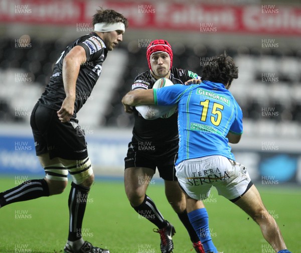 121012 Ospreys v TrevisoOspreys' Richard Fussell is tackled by Treviso's Luke McLean