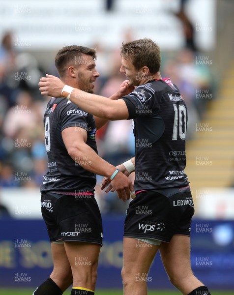 070516 - Ospreys v Ulster - Guinness PRO12 -Dan Biggar of Ospreys celebrates his try with Rhys Webb (left)